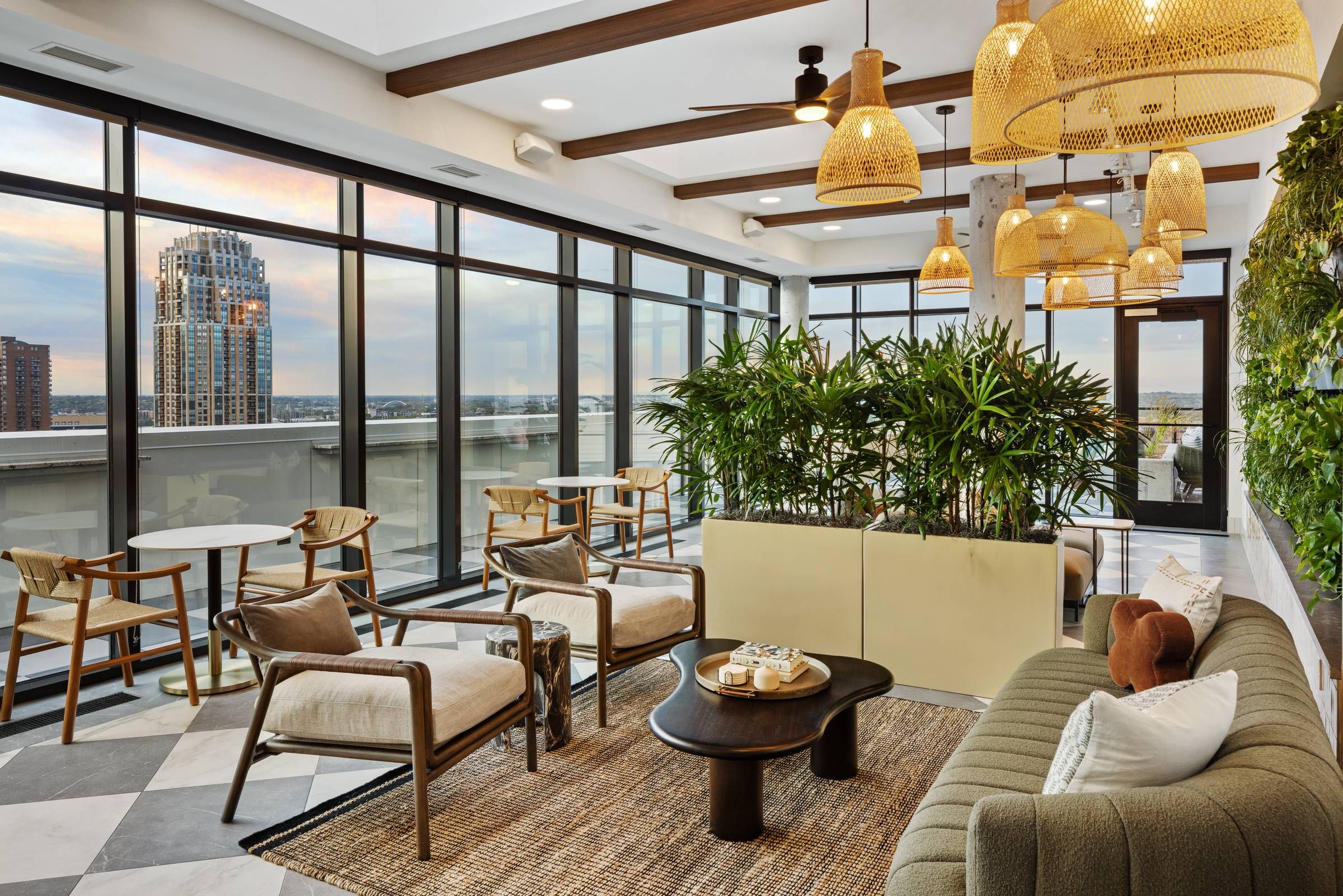 O2 Luxury Tower Conservatory with lounge and views of city skyline