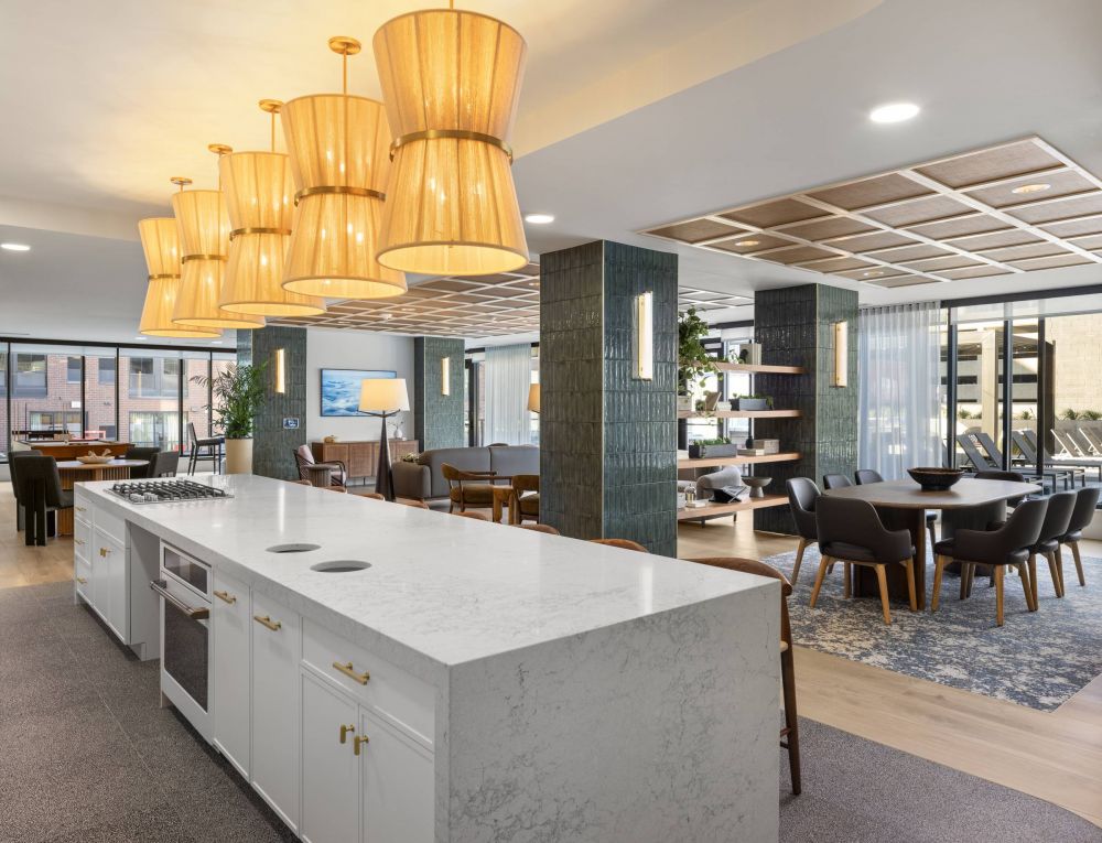 O2 Luxury Tower The Social Lounge Chef's Kitchen large group barstool seating and kitchen