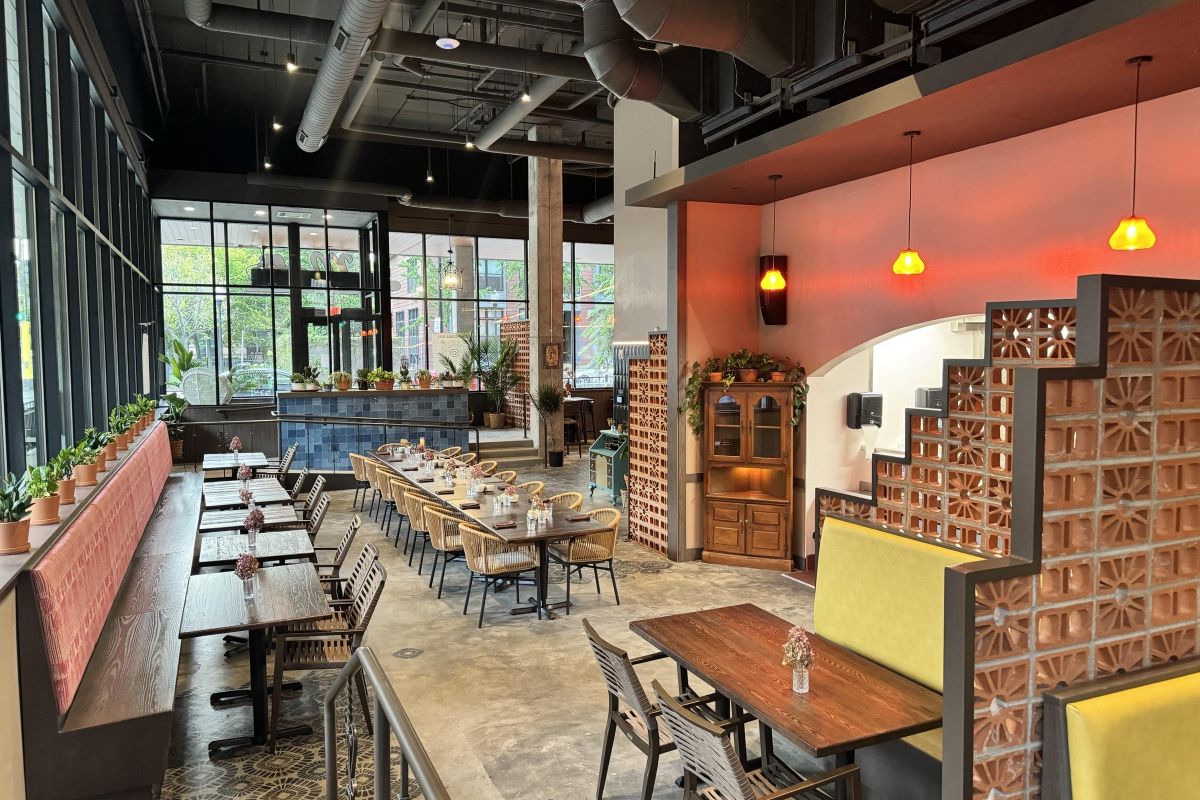 La Madre restaurant interior modern southwestern-inspired dining room with large windows, Minneapolis, MN